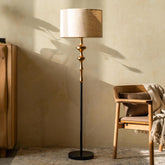 David Floor Lamp with gold plated lamp base, black finish, and natural linen shade. Elegant floor lamp for modern interiors.